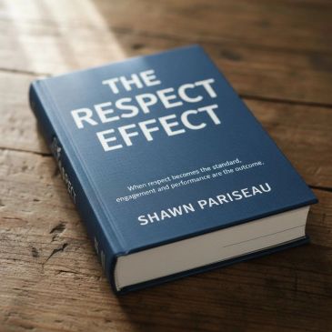 A book titled 'The Respect Effect' by Shawn Pariseau on a wooden surface.
