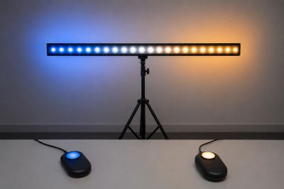 A light bar with blue and orange lights on a tripod stand.