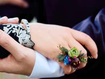 Fresh Flower Right Hand Ring worn at a wedding at Wrensmoore Castle. Photo by Flirt Photography