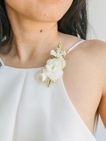 Petite flower corsage for the strap of a dress