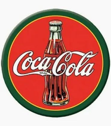 Vintage Coca-Cola logo with bottle on red circle.