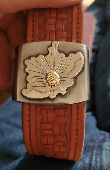 Custom silver flower overlay saddle hardware