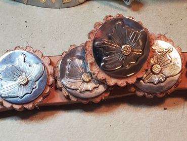 Custom silver flower saddle hardware