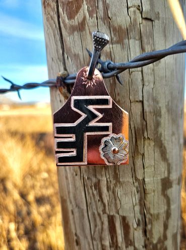 Custom copper pendant with silver overlay