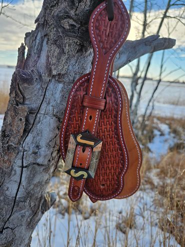 Custom tooled spur straps with custom buckles