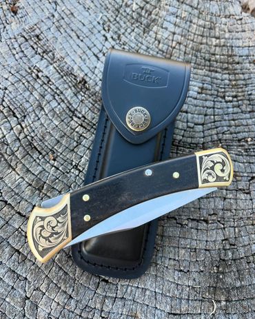 Custom engraved 110 Buck Knife