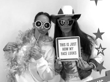 photo booth rental for veterans day event with props and backdrop