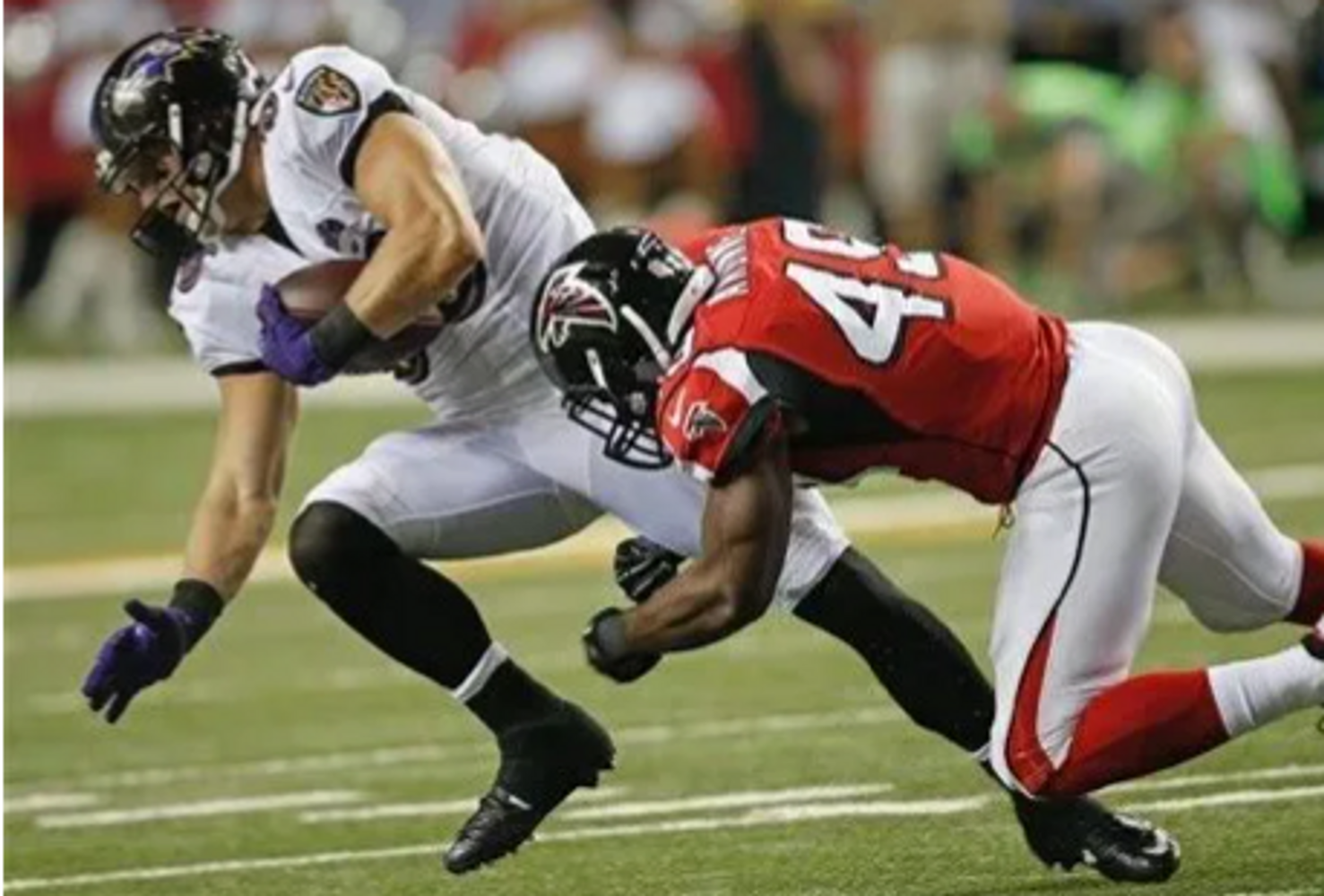 Konrad playing tight-end for the Baltimore Ravens