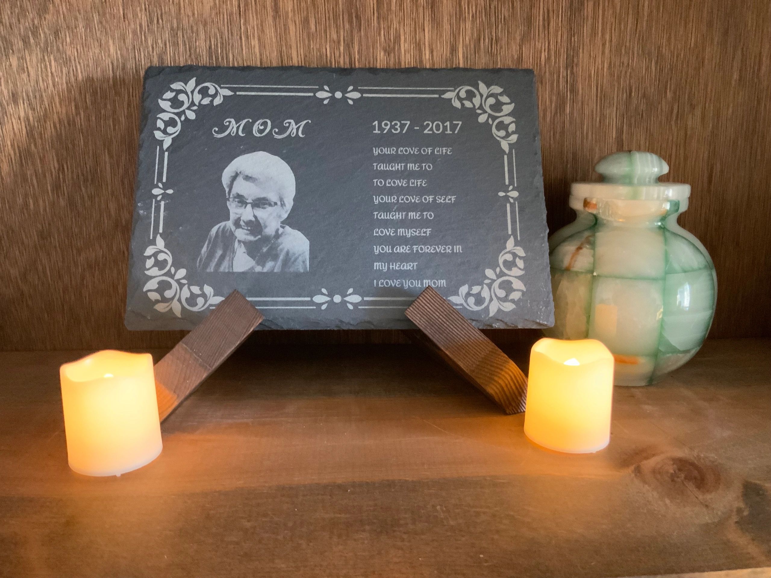 A stunning personalized slate plaque celebrating the life and death of your loved one.