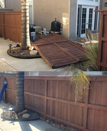 Fence repair. Wooden Fence repair.