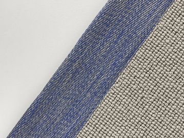 Close-up of fabric with blue and beige textured patterns.
