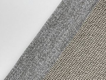 Close-up of three different textured fabric samples in white, gray, and beige.