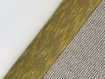 Close-up of yellow and gray textured fabric edges.