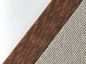 Close-up of textured brown and beige woven fabrics.
