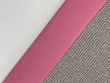 Close-up of three different fabric textures in white, pink, and beige.