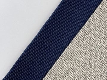 Close-up of textured fabric with navy blue and beige sections.