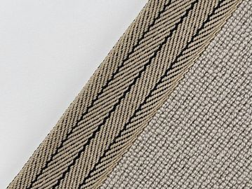 Close-up of two fabric textures with a striped edge.