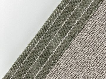 Close-up of fabric and stitched edge.