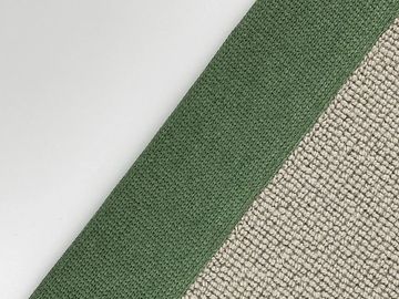 Close-up of green and beige textured fabric.
