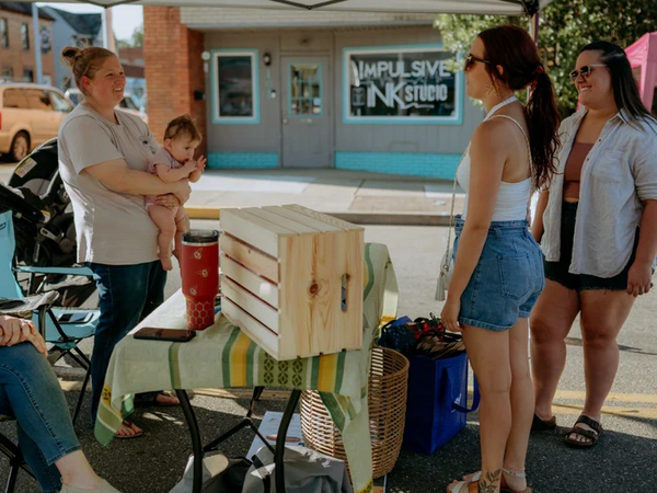 Volunteers at the Twin City Farmers Market in Dennison, Ohio