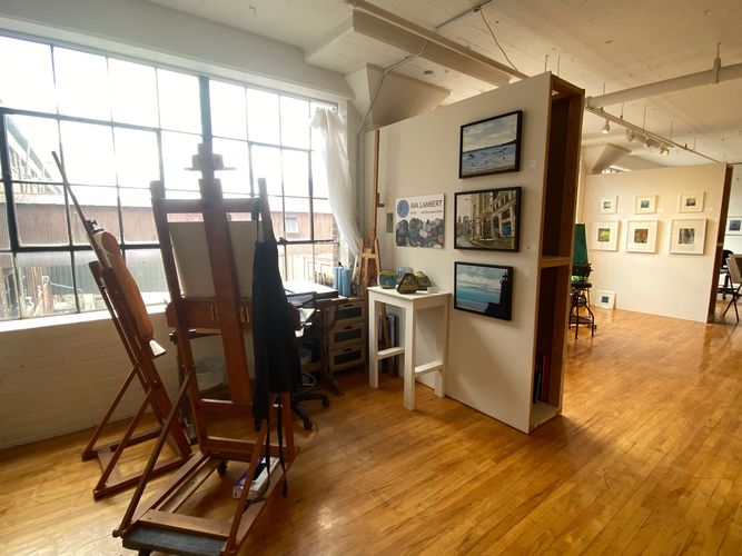 Artist's Studio with easels, paintings