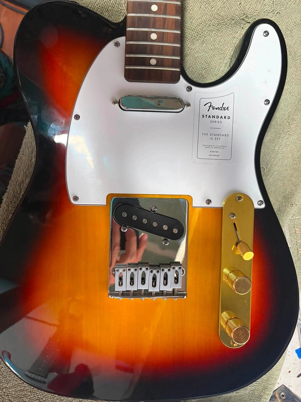 Close-up of a Fender Standard Series electric guitar.