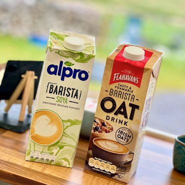 Oat milk latte, a delicious dairy-free option at Kerry Coffee, catering to various dietary needs alo