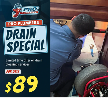 Plumber working under a sink with a $89 drain special offer.