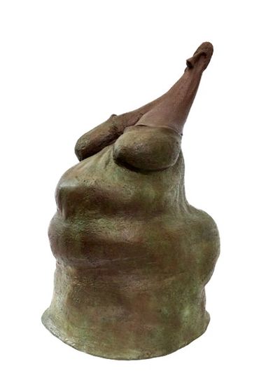 Abstract clay figurine.