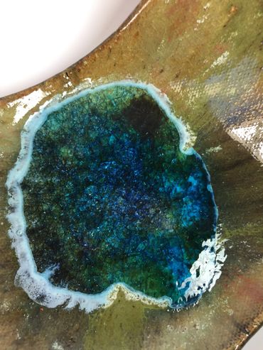 Close-up of the edge of a clay pot.