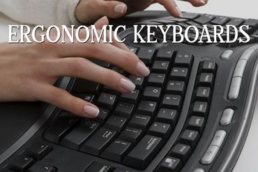 Hands typing on an ergonomic keyboard with the text 'ERGONOMIC KEYBOARDS'.
