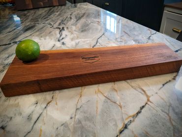 This fella is sleek and perfect for small jobs or a hunk of gorgeous cheese. (16.5 x 5 x 1") $30