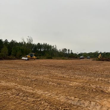 Grading 
Oil field
John Deere
Dozer 
Excavator 
Mud house land pad dirt clay ground rock land cleari