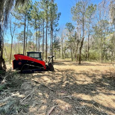 Mulcher mulching
Hydro ax
Cmi 
Kubota 
Tractor 
Land clearing 
Dirt work
Home site prep underbrush