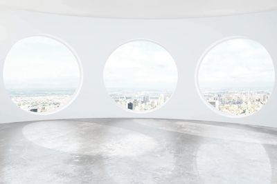 Image of three window portals inviting new perspective, heightened views.