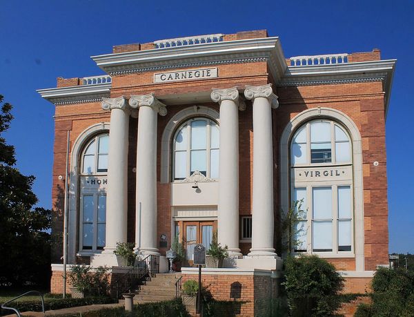 Historic Carnegie building with tall columns.