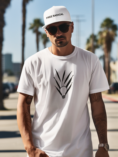 Man wearing a white cap and t-shirt with sunglasses outdoors.