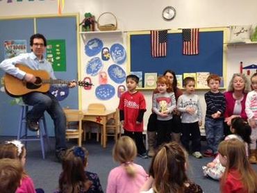 Children singing in a music class