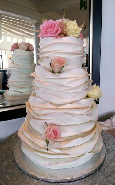 Rose petal, gold, pink wedding cake