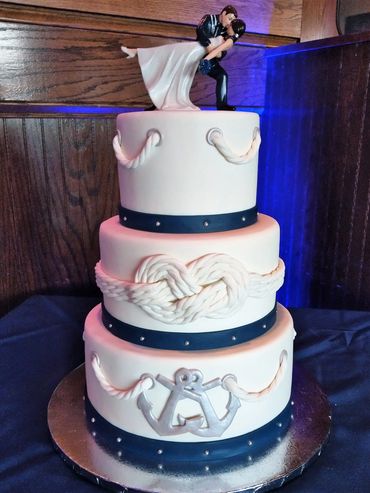 Blue nautical, rope, anchors, wedding cake