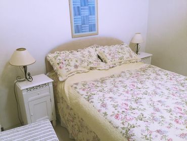 Main bedroom with vaulted ceiling