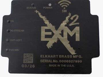 Metal plate with Elkhart Brass MFG details.