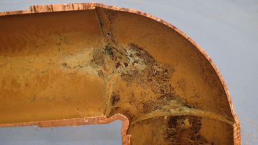 Pin hole leaks in copper pipe transitions.