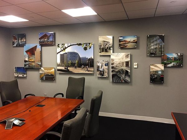 Photos hanging in a conference room
