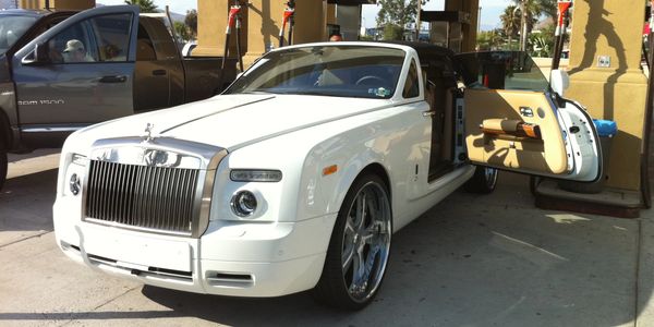 Custom White Rolls Royce at Doheny village Hand Car Wash.