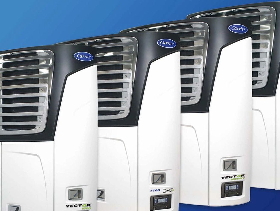 A lineup of Carrier Vector refrigeration units against a blue background.