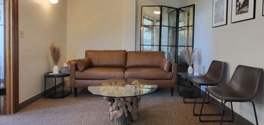 Waiting Room, leather sofa, sophisticated medical clinic design