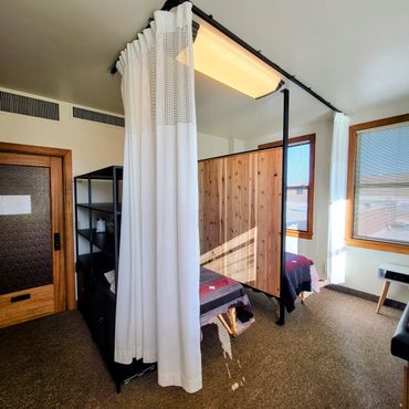 Hydrotherapy Bays for Gentle Detox Treatment in Solarium Room with cedar wood