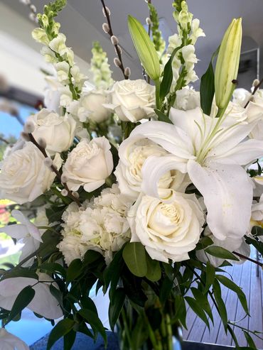 Stunning white wedding day flowers