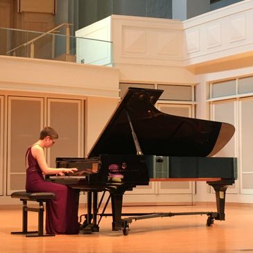 Our pianist, Rebecca Luppe, performs at a recital at Indiana Unicversity.